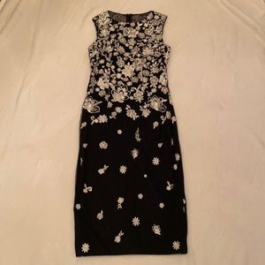 White House black market dress. Black with white embroidered flowers. Size 2